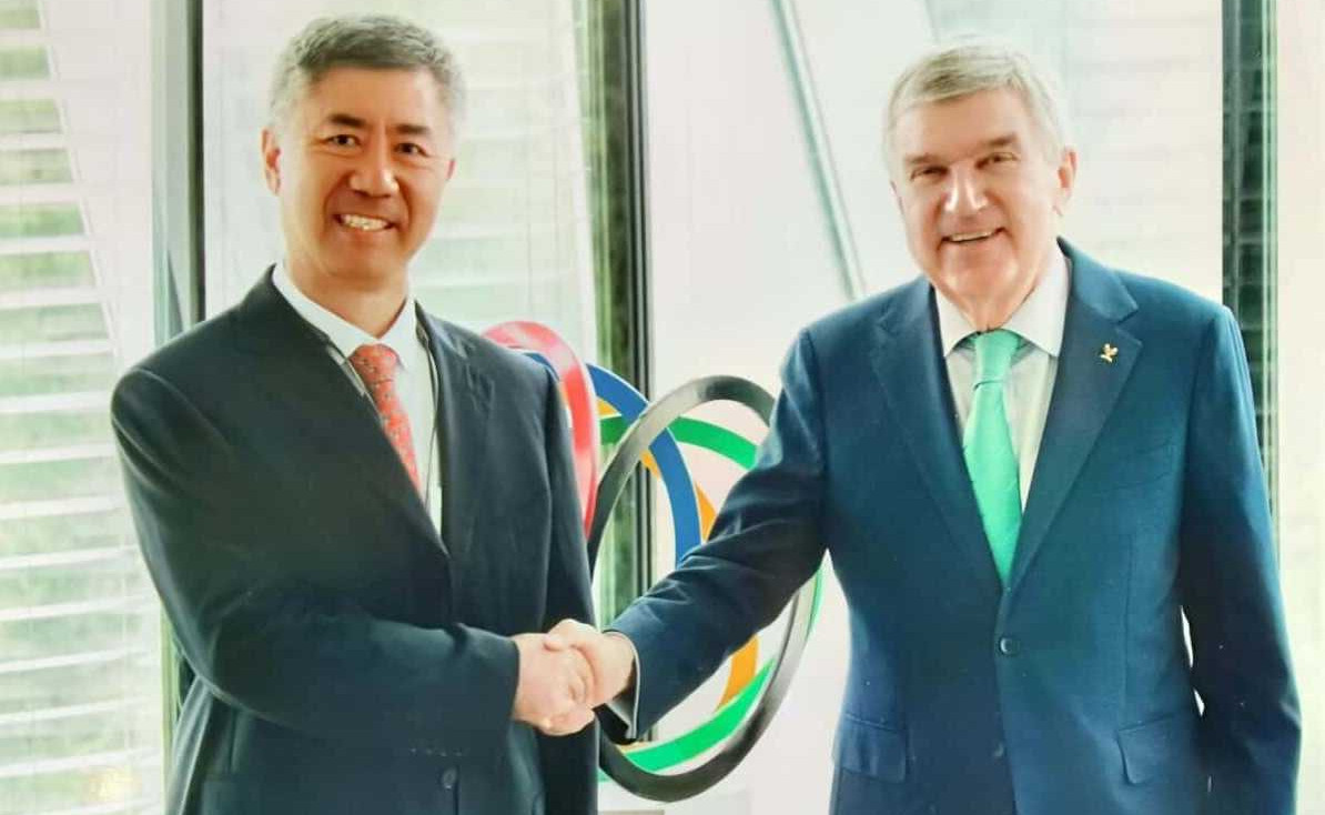 Цюаньхай Ли и Томас Бах